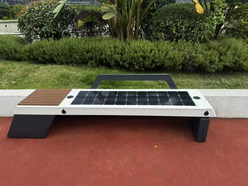 A public park bench equipped with integrated solar panels for generating electricity.