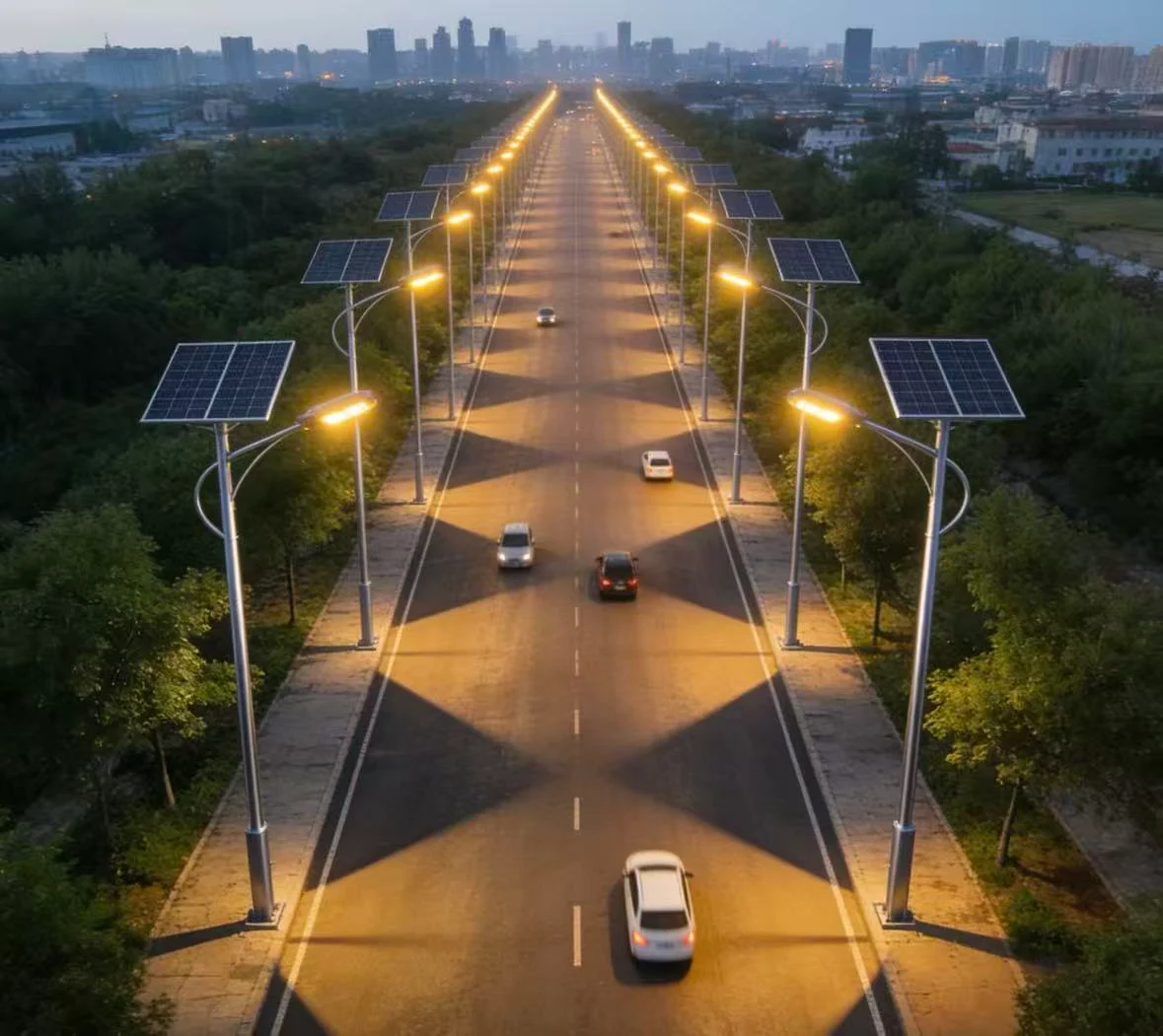 Rows of solar-powered street lights illuminating a road at night.